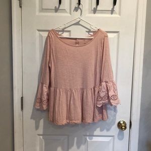 Pink peplum shirt with lace sleeves